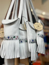 Sac frangé en cuir blanc